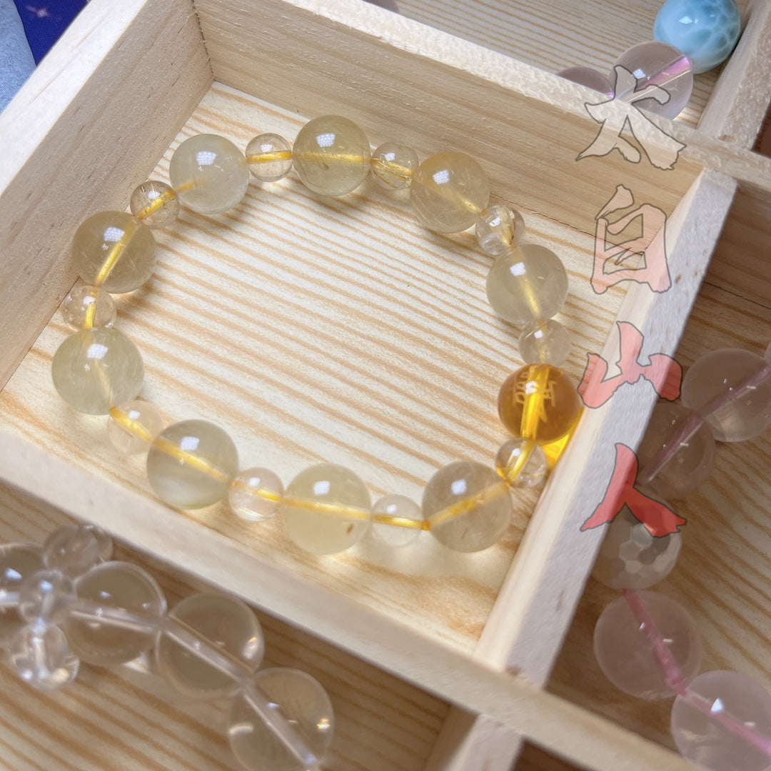 Natural Yellow Rabbit Hair Quartz Bracelet with Daoist Talisman Bead (12mm)
